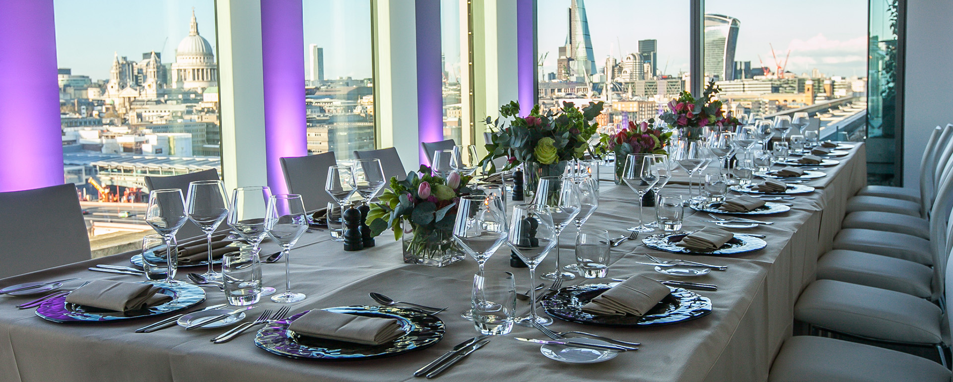 Table set for an event in Level 12 Rooms