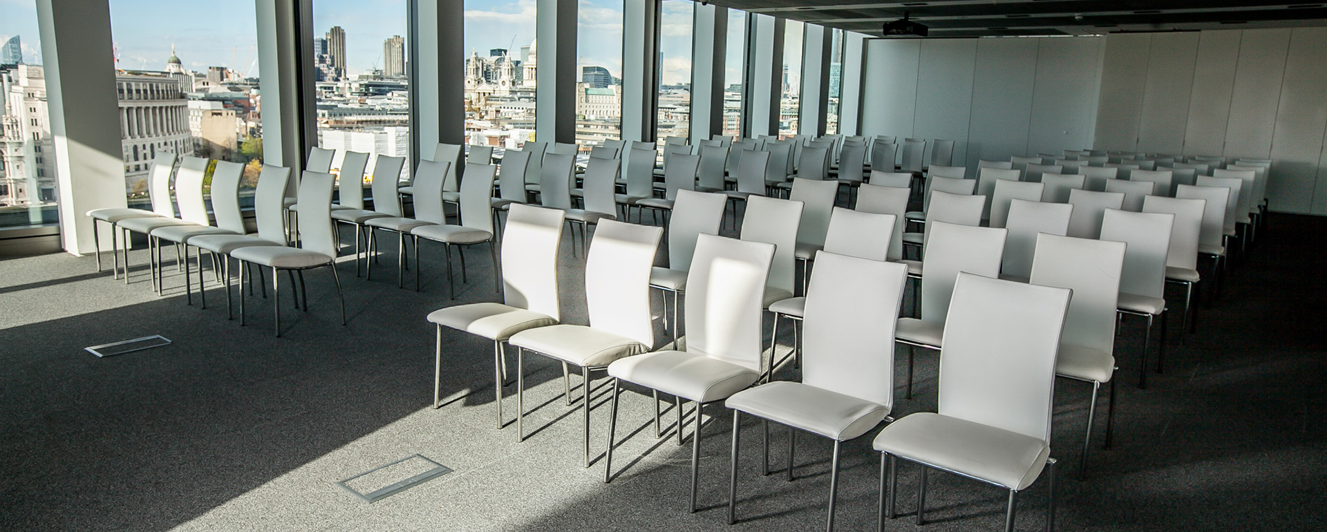 Chairs set up for a conference in Level 12 Room